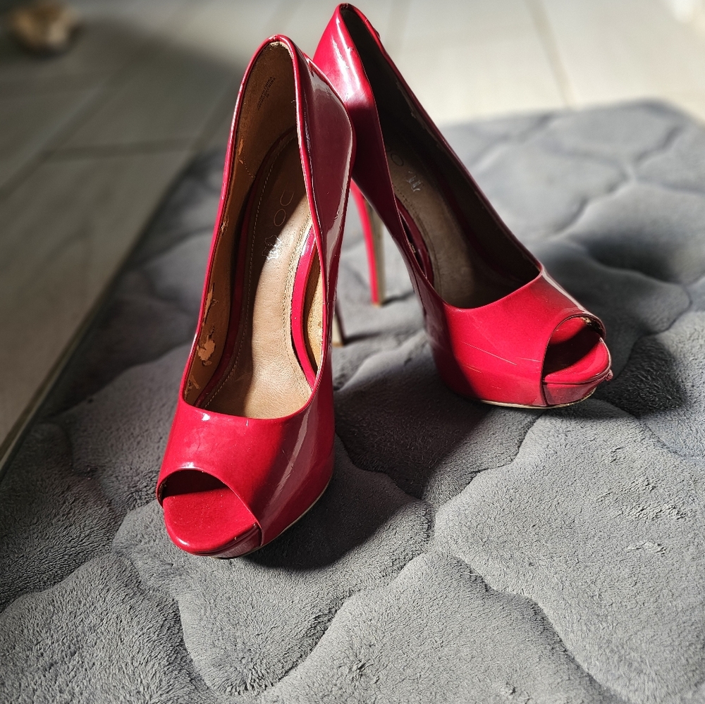 Red Aldo Pumps